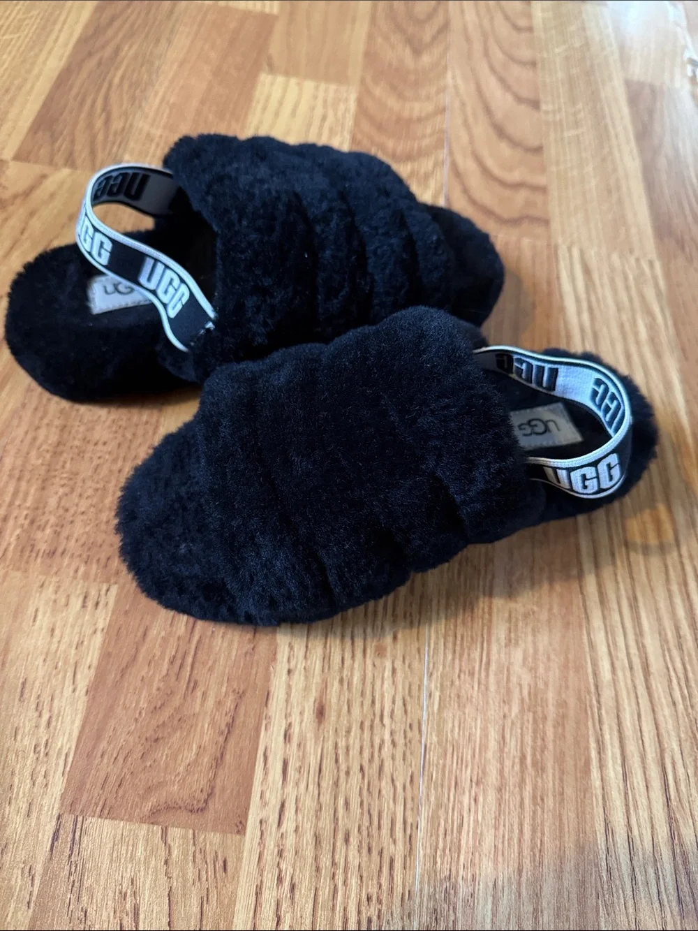 UGG Kids Black Fuzzy Slide Sandals with Branded Elastic Heel